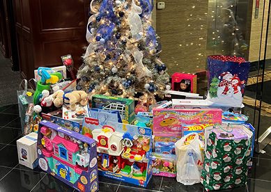 Donations for Toys for Tots under tree in Stifel's Rochester, Michigan office